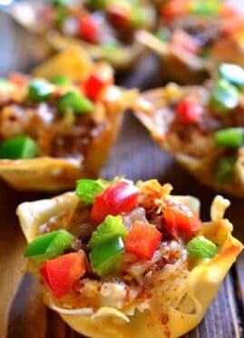 Southwest Chicken Wonton Cups are loaded with creamy chicken, cheese, and peppers and packed with delicious southwest flavor. The perfect holiday appetizer - sure to become a new family favorite!