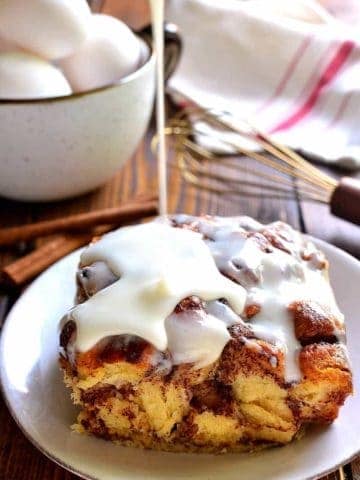 Cinnamon Roll French Toast Casserole takes cinnamon rolls to the next level in an ooey, gooey, delicious baked French toast recipe that's perfect for the holidays!