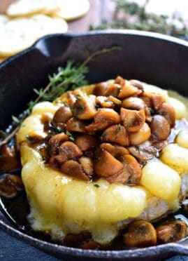 Mushroom Marsala Baked Brie combines rich marsala-glazed mushrooms with creamy baked brie in a delicious appetizer that's perfect for New Years Eve or anytime!
