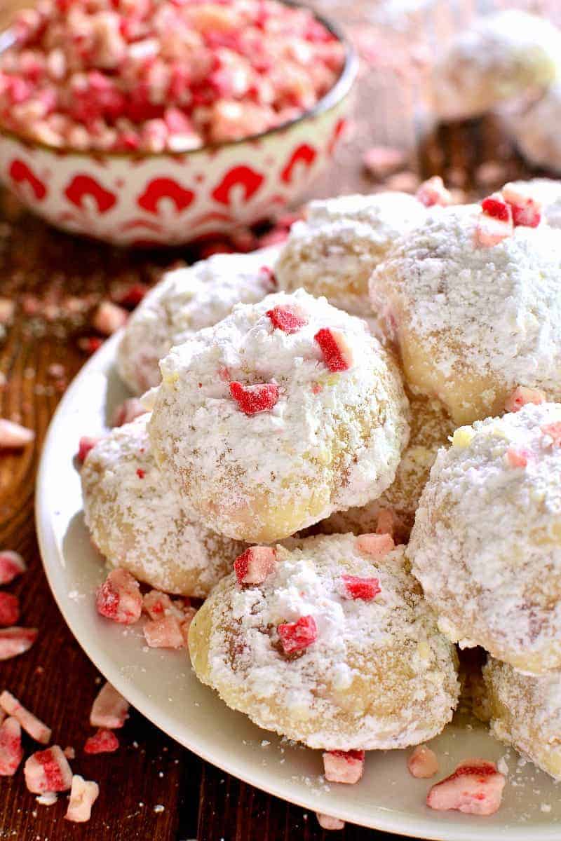 Peppermint Snowballs are the perfect holiday twist on a classic! Packed with peppermint and the right amount of crunch, these easy cookies are a must make!