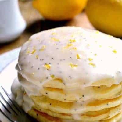Lemon Poppy Seed Pancakes are light, fluffy, and bursting with lemon flavor! Easy breakfast pancakes to start your day off right. Try them with lemon poppy seed glaze for a sweet, tart, delicious start to your day.