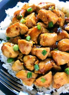 Skinny Orange Chicken - a delicious, lightened up version of your favorite takeout! This easy recipe comes together in 30 minutes or less and is guaranteed to satisfy the whole family!