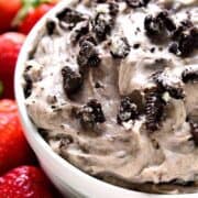 Oreo Dip is loaded with the delicious flavors of cookies & cream and perfect for dipping strawberries, cookies, or any of your favorite dippers! This simple dessert dip is also great with a spoon!
