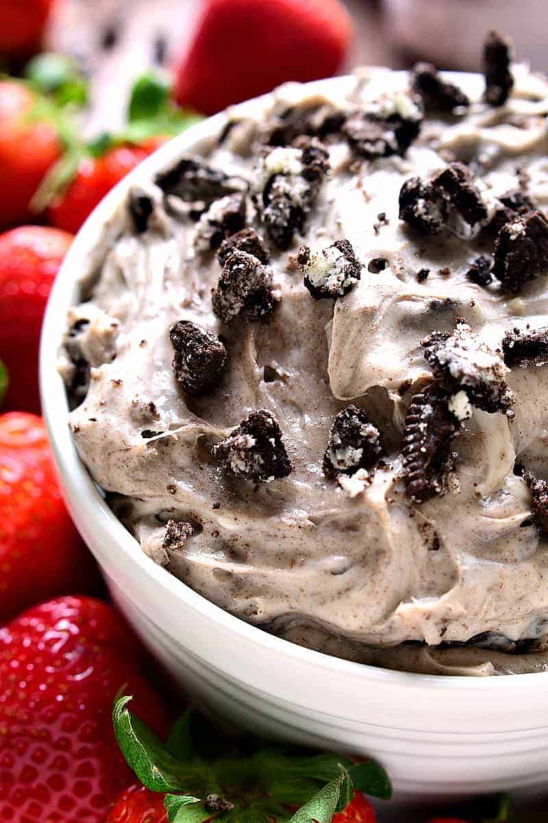 Oreo Dip is loaded with the delicious flavors of cookies & cream and perfect for dipping strawberries, cookies, or any of your favorite dippers! This simple dessert dip is also great with a spoon!
