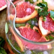 Grapefruit Mojitos are a delicious twist on a classic mojito. These easy mojitos combine grapefruit juice, lime juice, mint, and rum in a refreshing drink