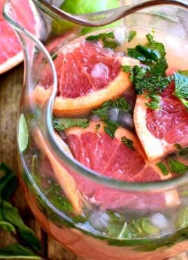 Grapefruit Mojitos are a delicious twist on a classic mojito. These easy mojitos combine grapefruit juice, lime juice, mint, and rum in a refreshing drink