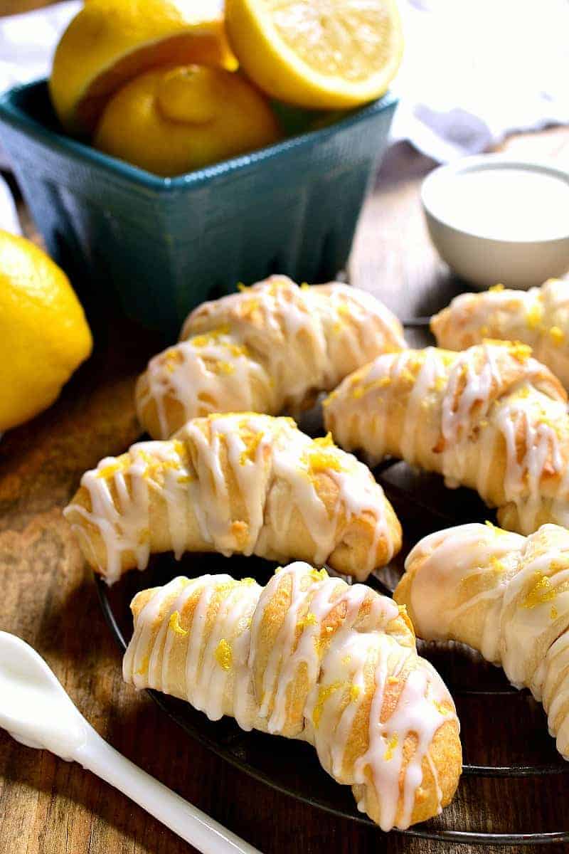 Lemon Cheesecake Crescent Rolls are bursting with bright lemon flavor! Flaky crescent rolls filled with creamy lemon cheesecake, topped with a citrus glaze...the perfect brunch recipe!