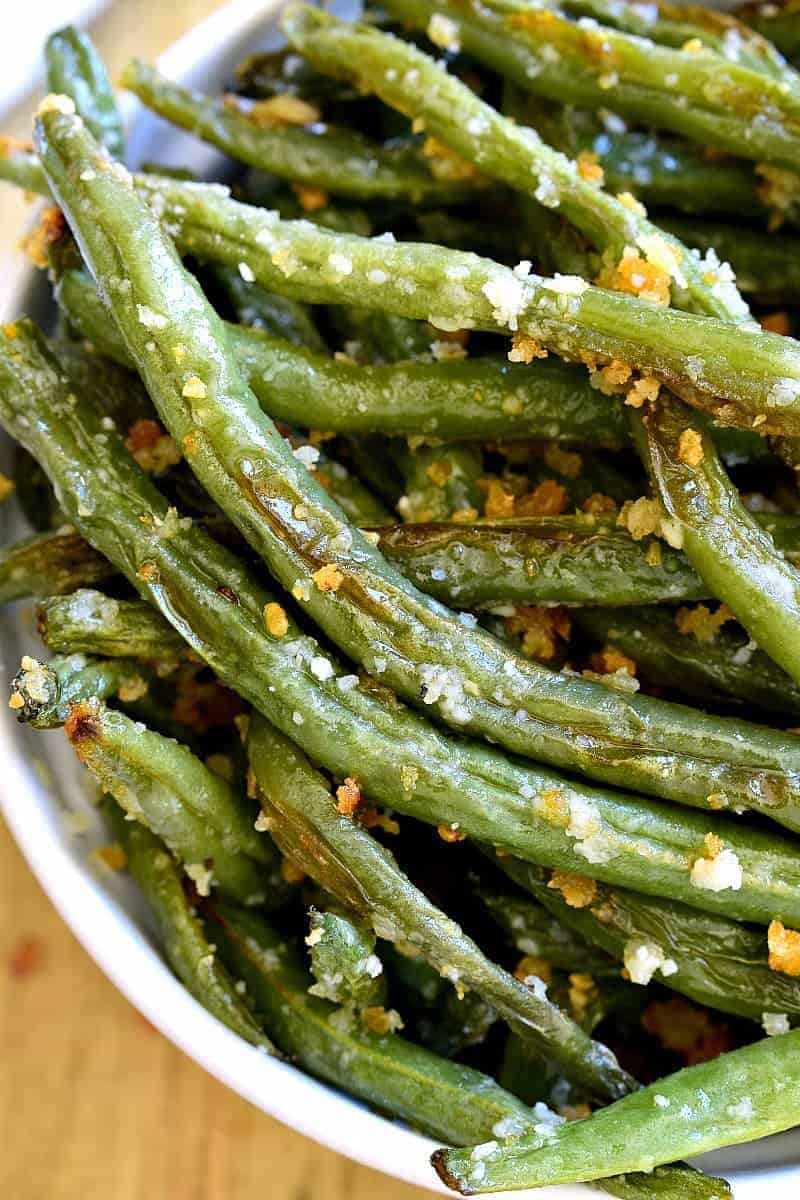 Parmesan Roasted Green Beans are a delicious way to enjoy fresh green beans! Perfect for holidays, dinners, or a healthy snack.