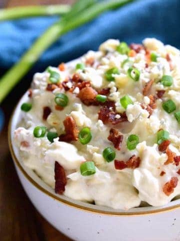 This Bacon Blue Cheese Dip is the ultimate easy party dip! Loaded with the delicious flavors of bacon and blue cheese, this dip is creamy, flavorful, and perfect for easy entertaining!