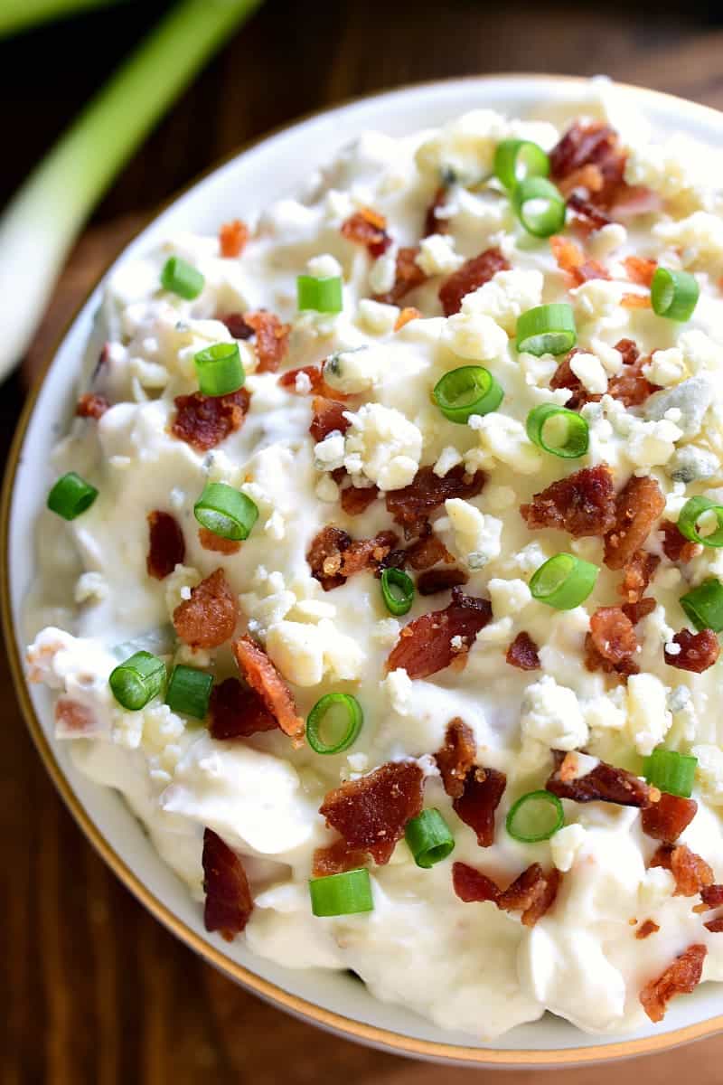 This Bacon Blue Cheese Dip is the ultimate easy party dip! Loaded with the delicious flavors of bacon and blue cheese, this dip is creamy, flavorful, and perfect for easy entertaining!