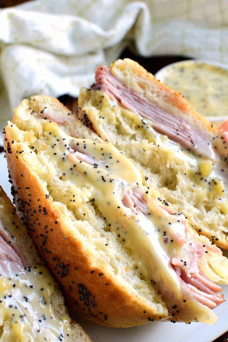 This Honey Mustard Ham and Cheese Sandwich is perfect when paired with a hot soup or crisp salad. A poppyseed infused mustard will elevate this hot sandwich!