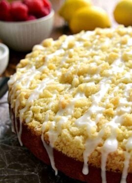 This Lemon Raspberry Coffee Cake is the perfect cake for spring! This delicious coffee cake will enhance your brunch menu or with your next cup of coffee!