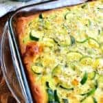 Cheesy Zucchini Bake is one of my favorite ways to use garden zucchini! This delicious meatless recipe with eggs is great for breakfast, lunch, or dinner...and so easy to make!