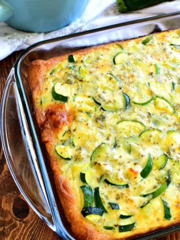 Cheesy Zucchini Bake is one of my favorite ways to use garden zucchini! This delicious meatless recipe with eggs is great for breakfast, lunch, or dinner...and so easy to make!