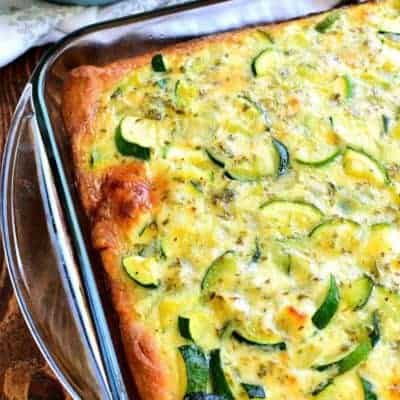 Cheesy Zucchini Bake is one of my favorite ways to use garden zucchini! This delicious meatless recipe with eggs is great for breakfast, lunch, or dinner...and so easy to make!