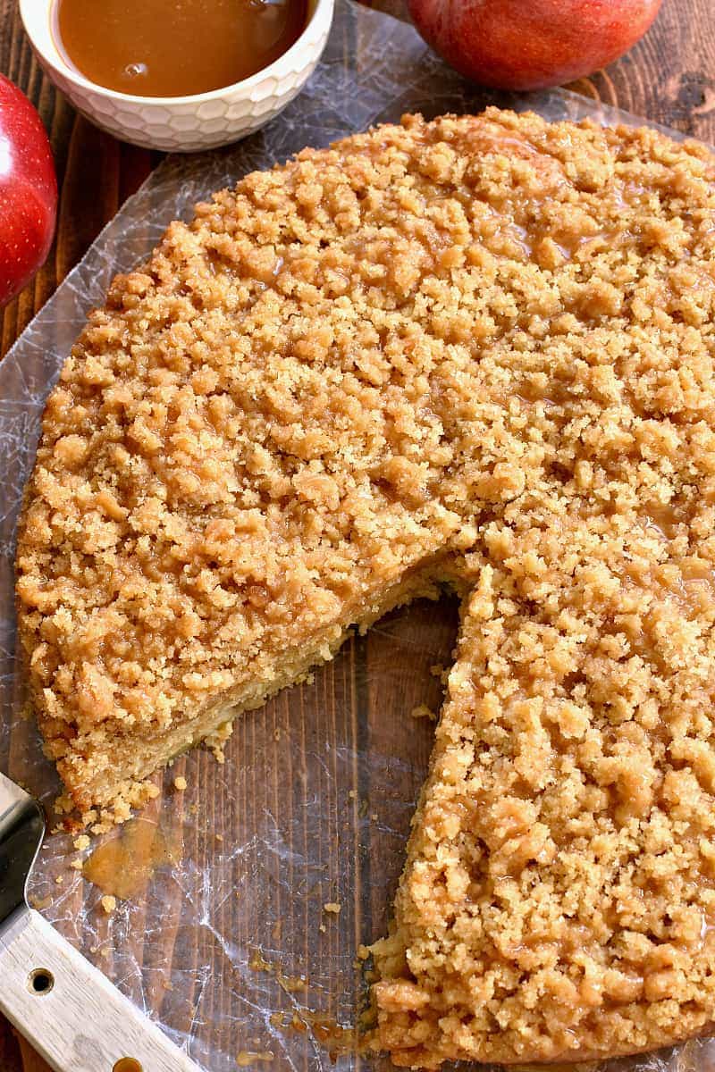 This Caramel Apple Coffee Cake is the ultimate taste of fall! Loaded with fresh apples and topped with gooey caramel, this is one breakfast treat your family will ask for again and again!