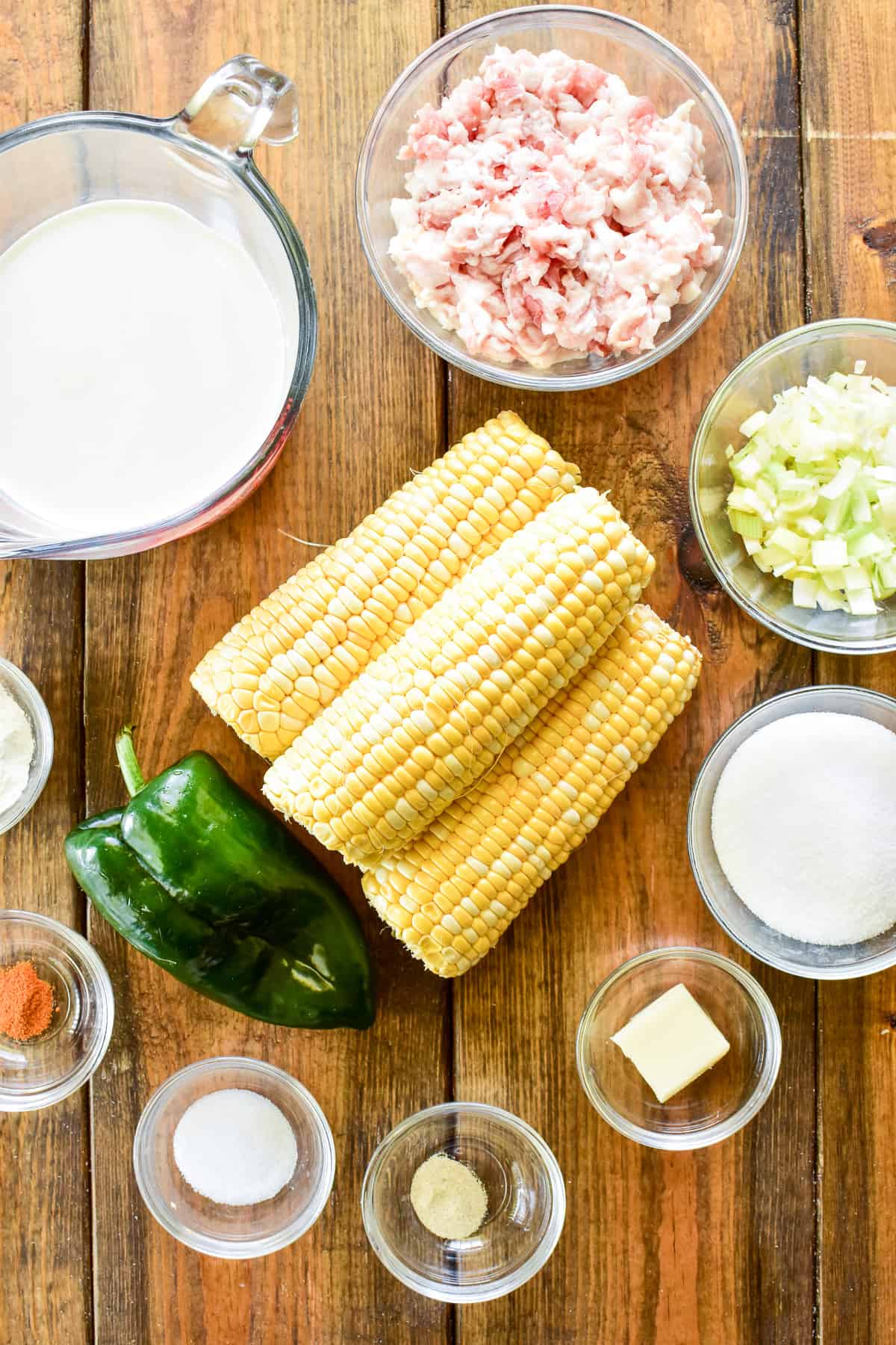 Creamed Corn ingredients on a wooden table