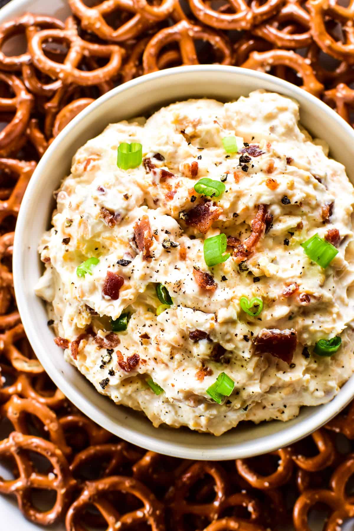 Overhead close up of Beer Cheese Dip with pretzels