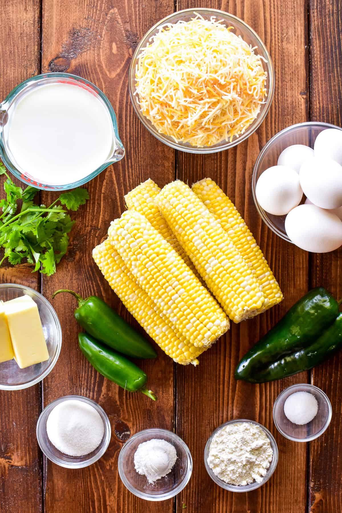 Corn Pudding ingredients on a wooden board