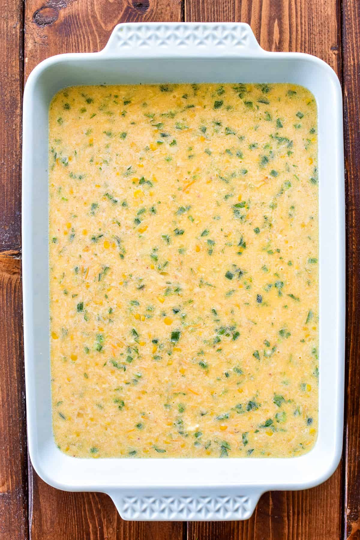 Corn Pudding batter in a baking pan