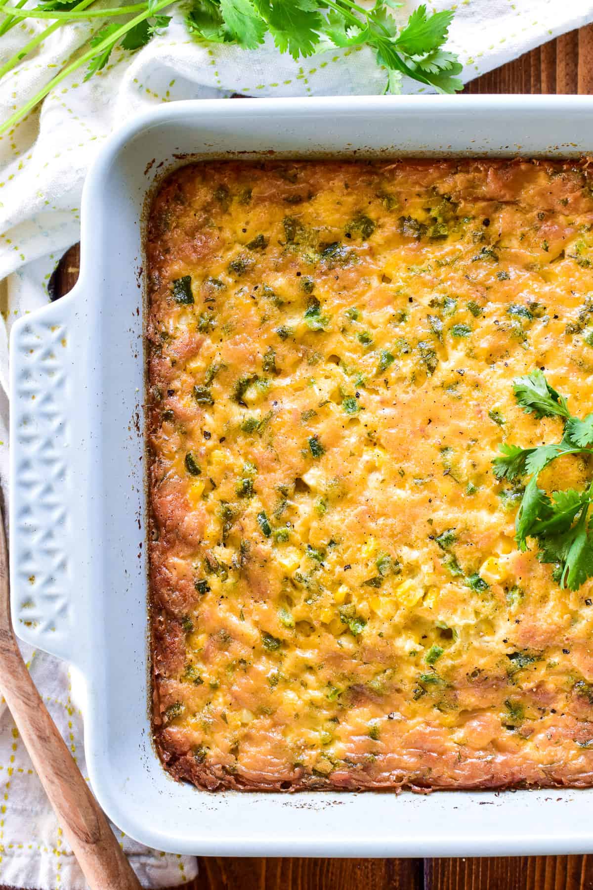 Corn Pudding in a light blue baking pan