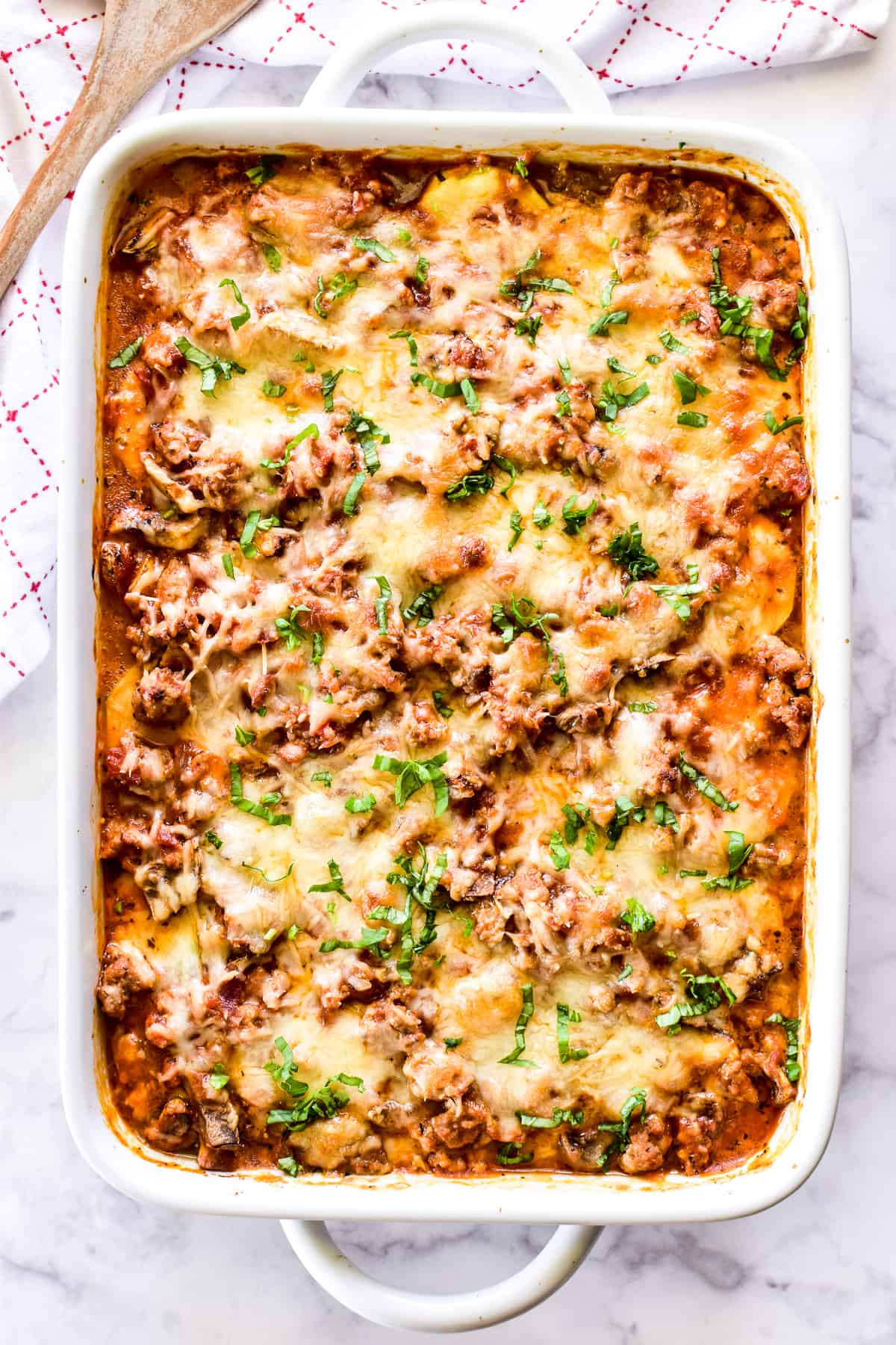 Overhead shot of Zucchini Lasagna in white pan