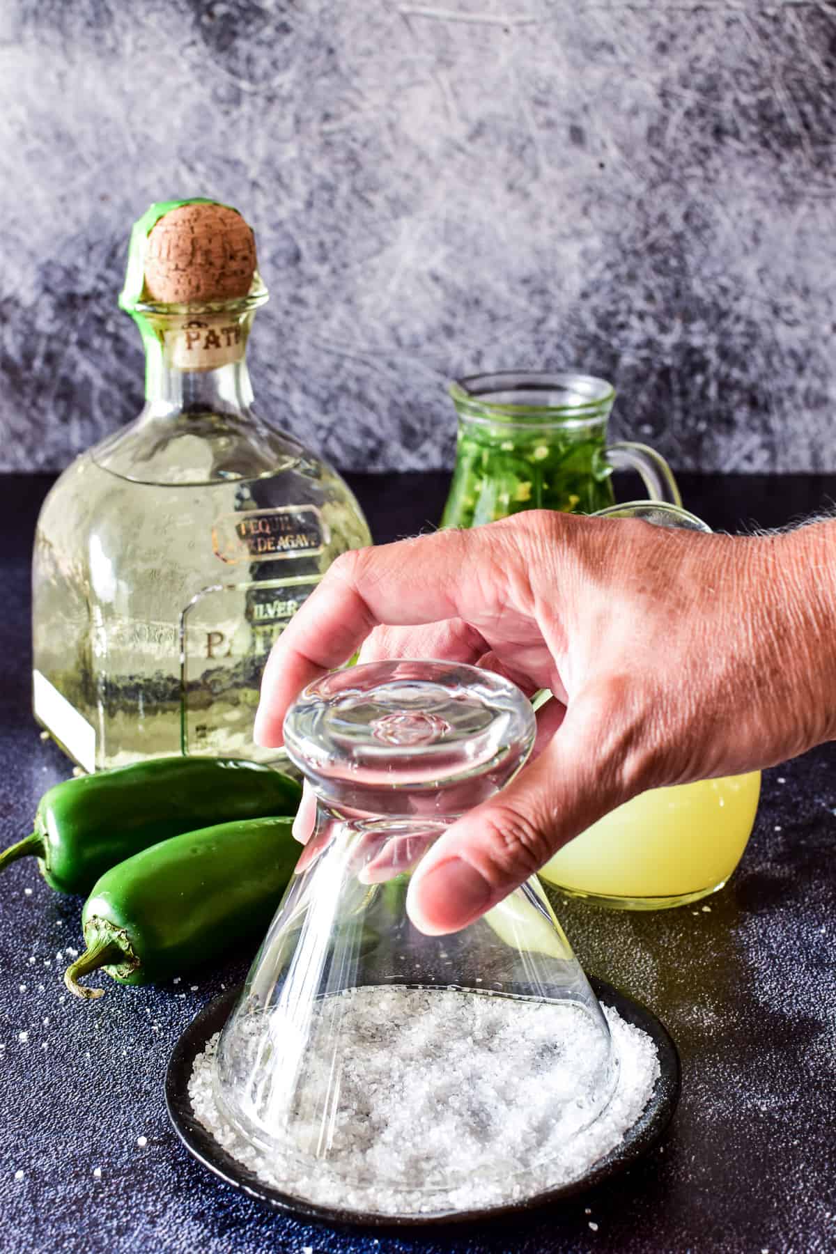 Dipping glass rim in salt