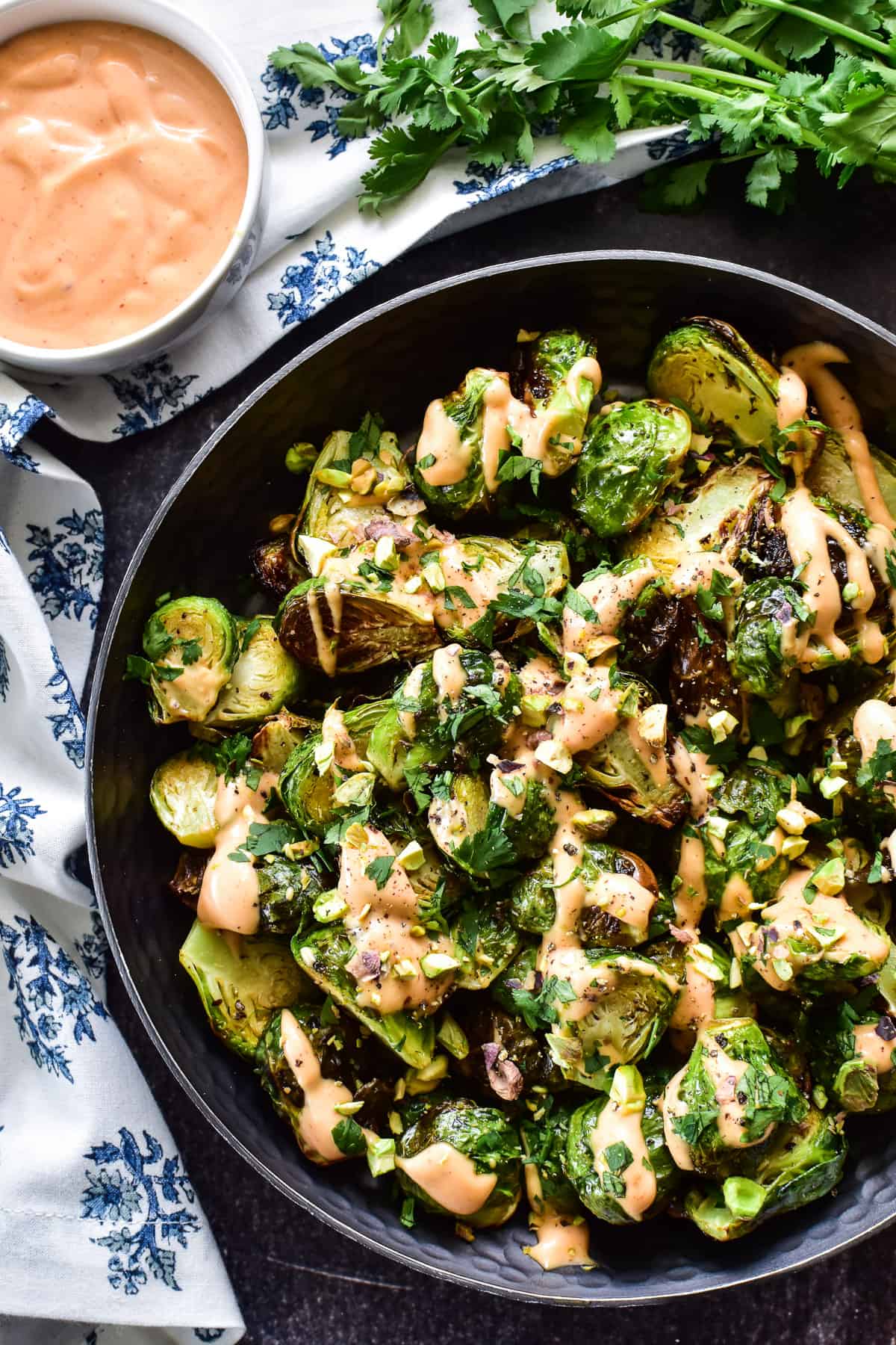 Overhead shot of Air Fryer Brussels Sprouts in a metal serving dish