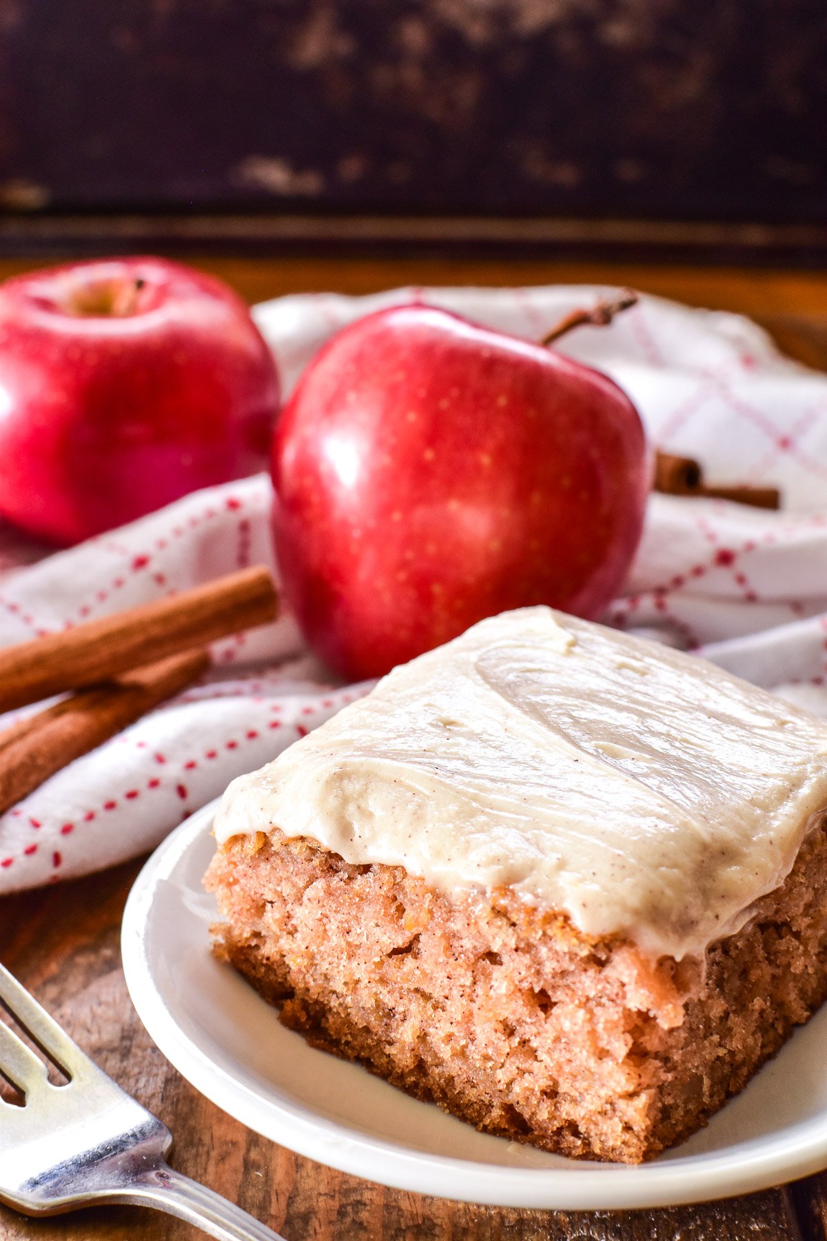 Side shot of Apple Cake on a white plate