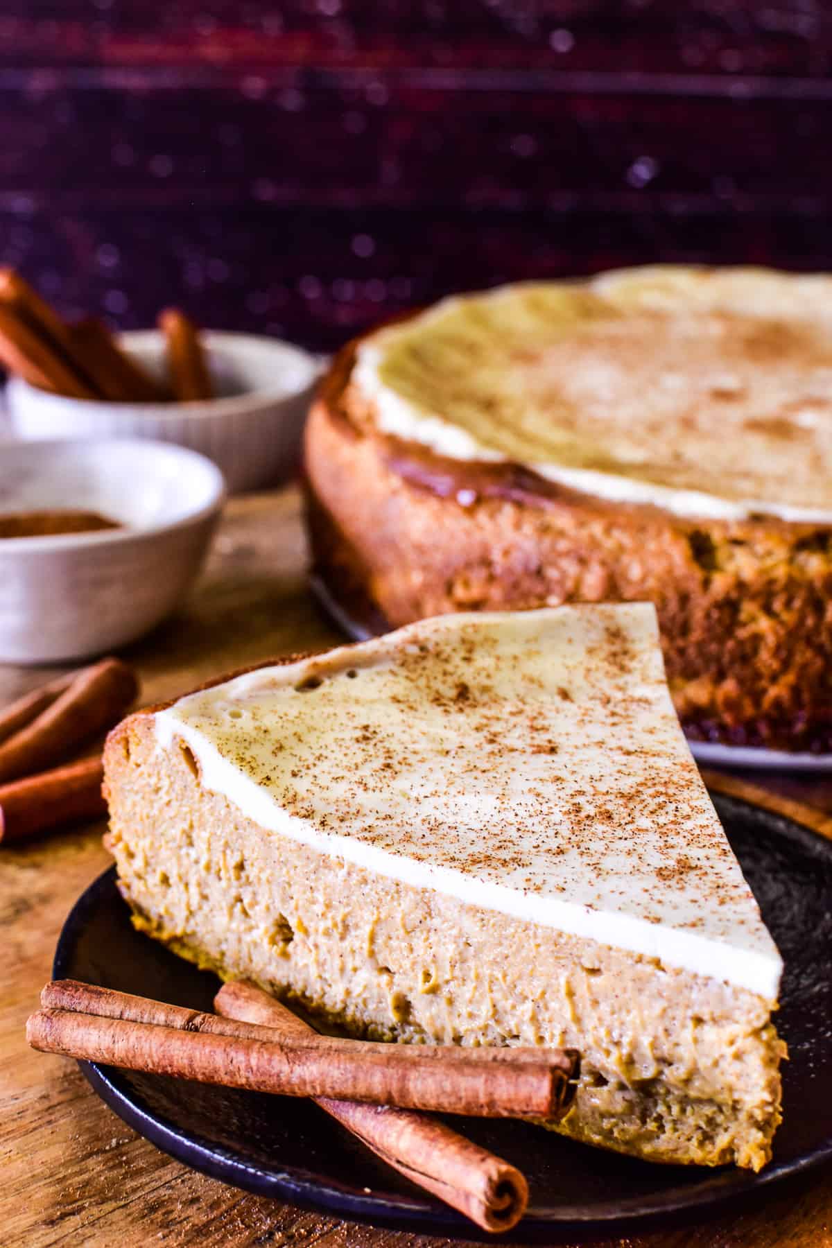 Side view of a slice of Pumpkin Cheesecake