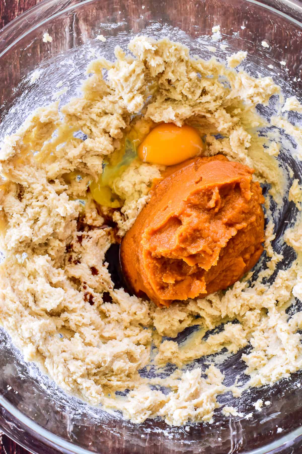 Ingredients being mixed in a glass mixing bowl