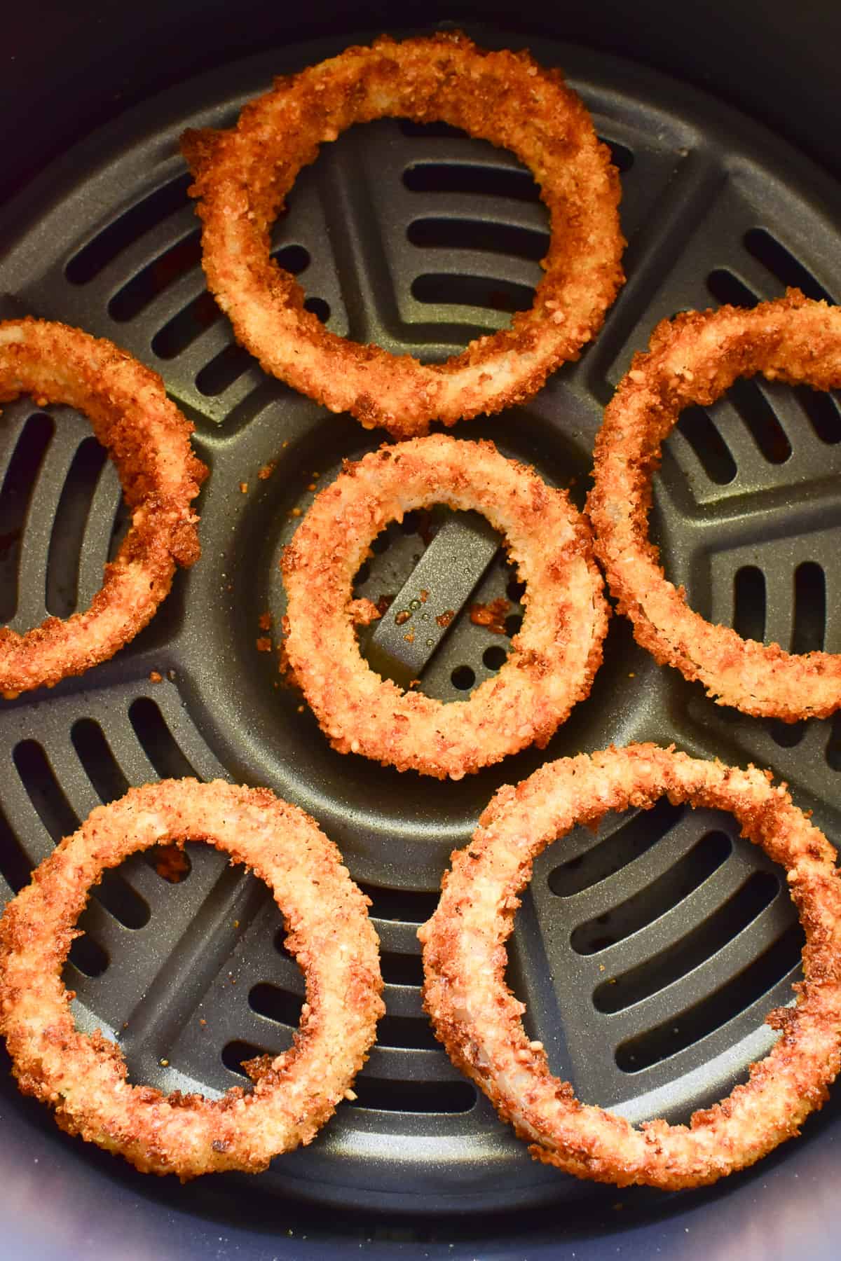 Onion Rings in an air fryer basket