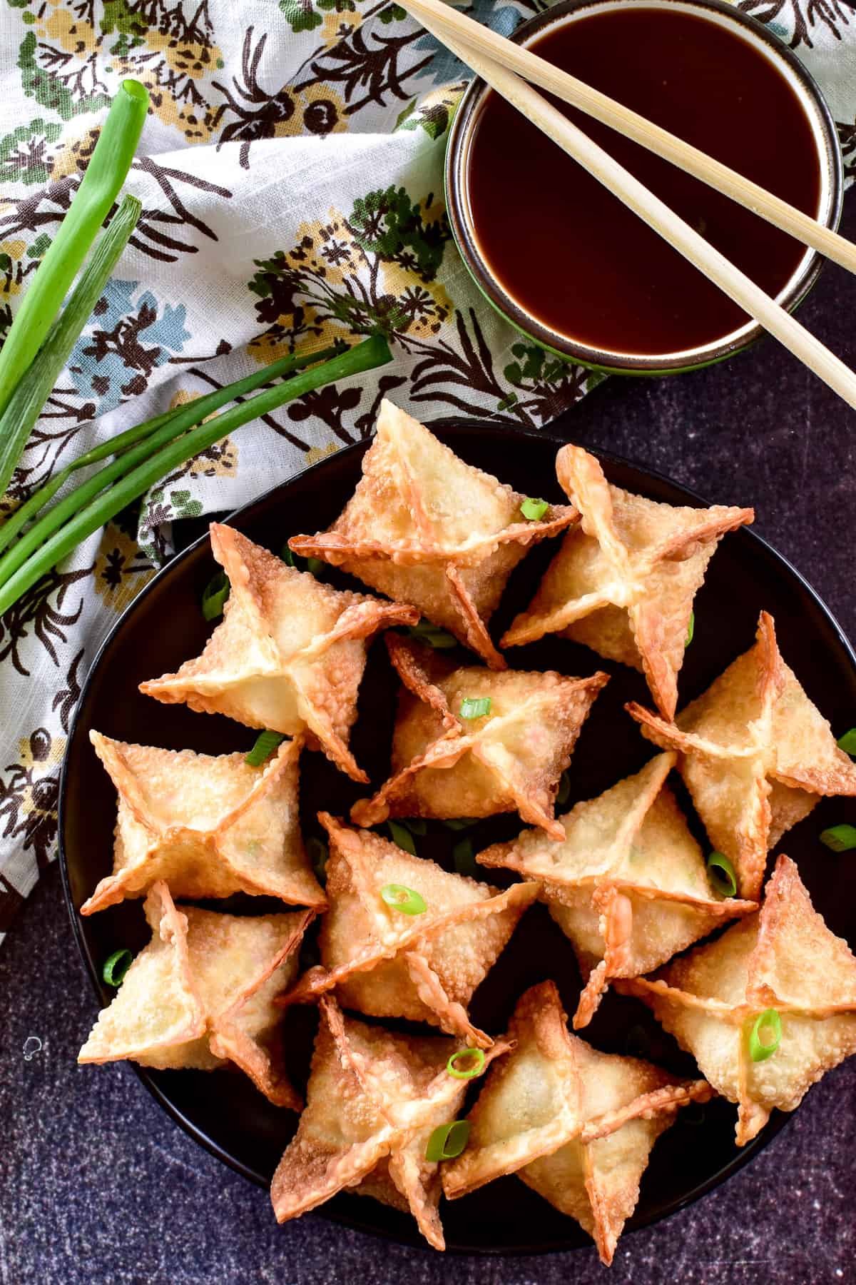 Overhead image of Crab Rangoon with floral towel