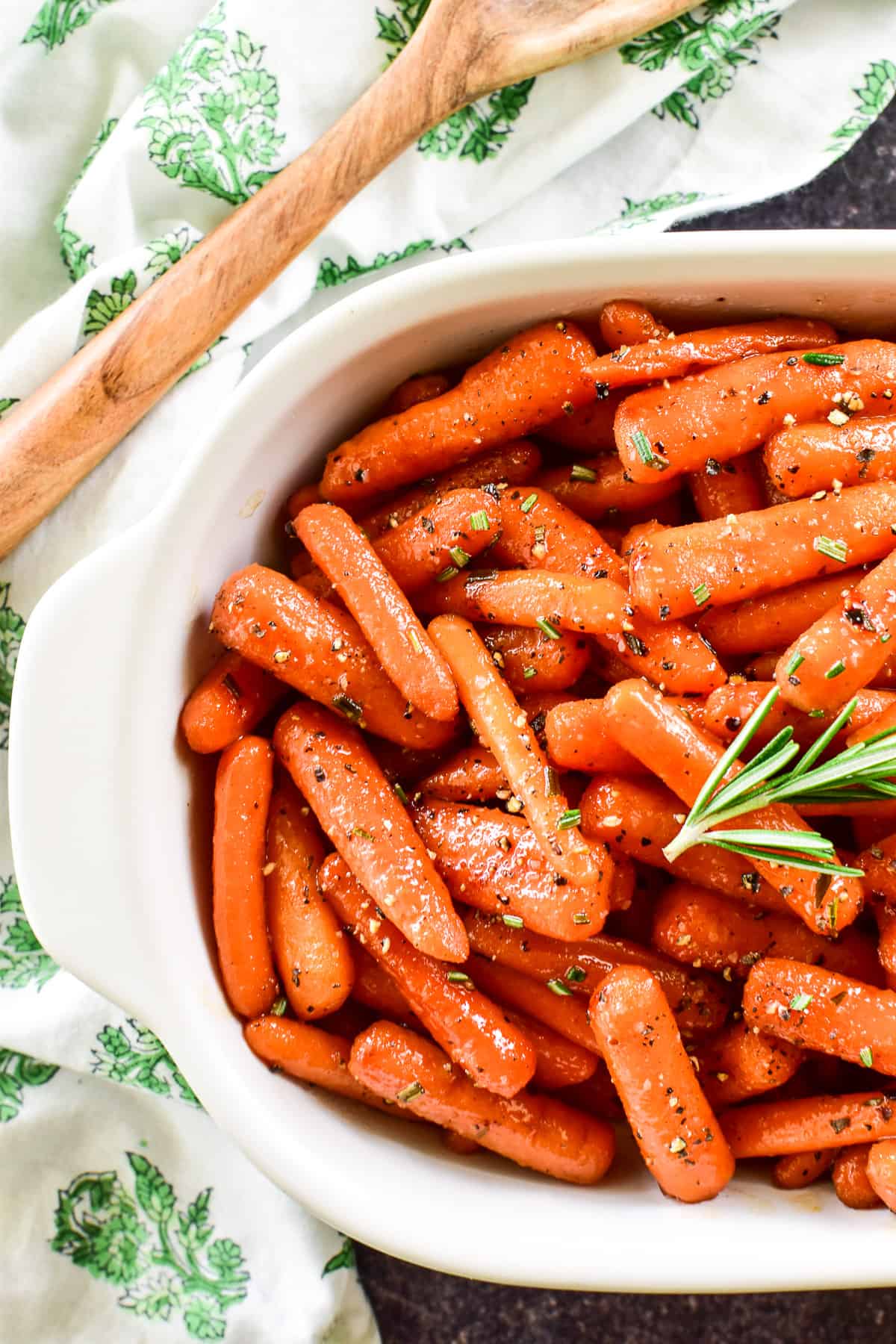 Overhead shot of Honey Glazed Carrots with fresh rosemary