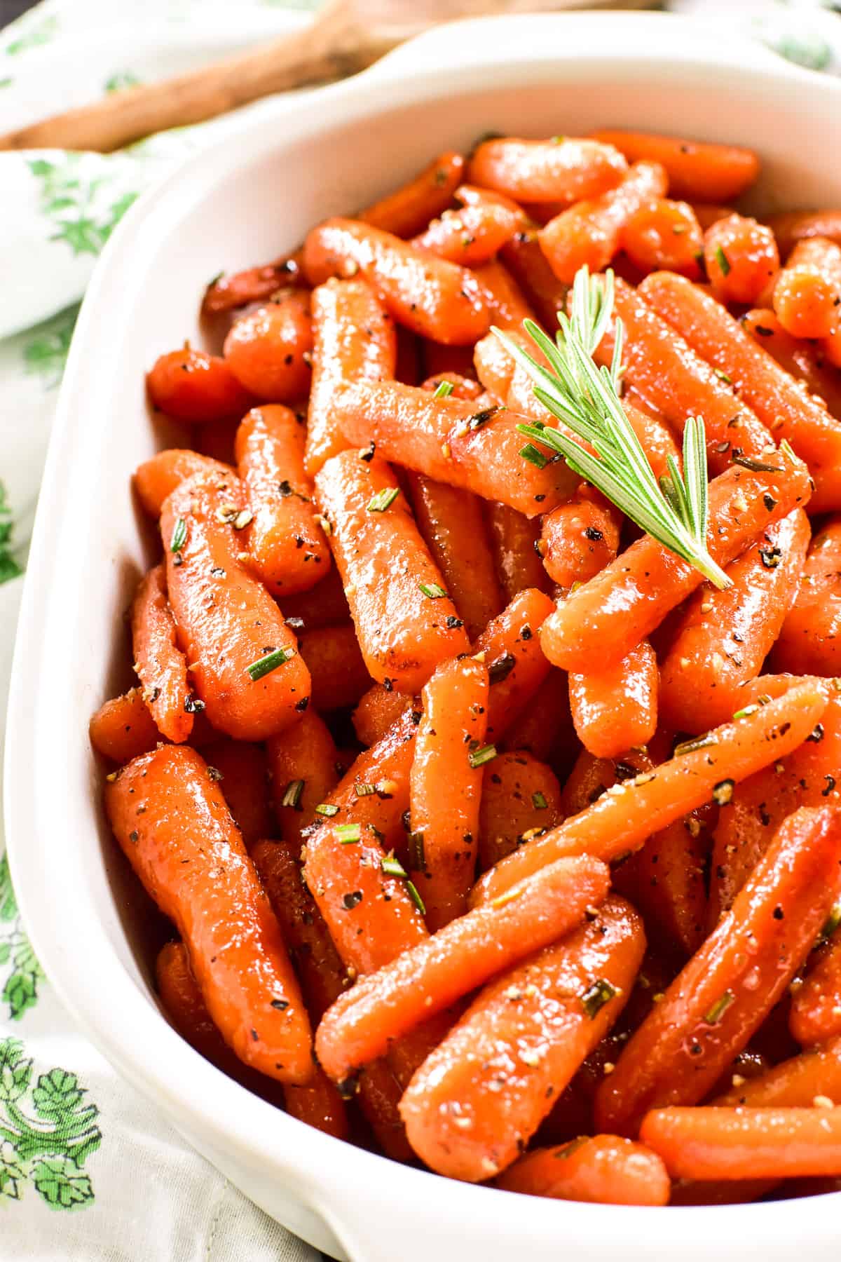 Finished shot of Honey Glazed Carrots in a white serving dish