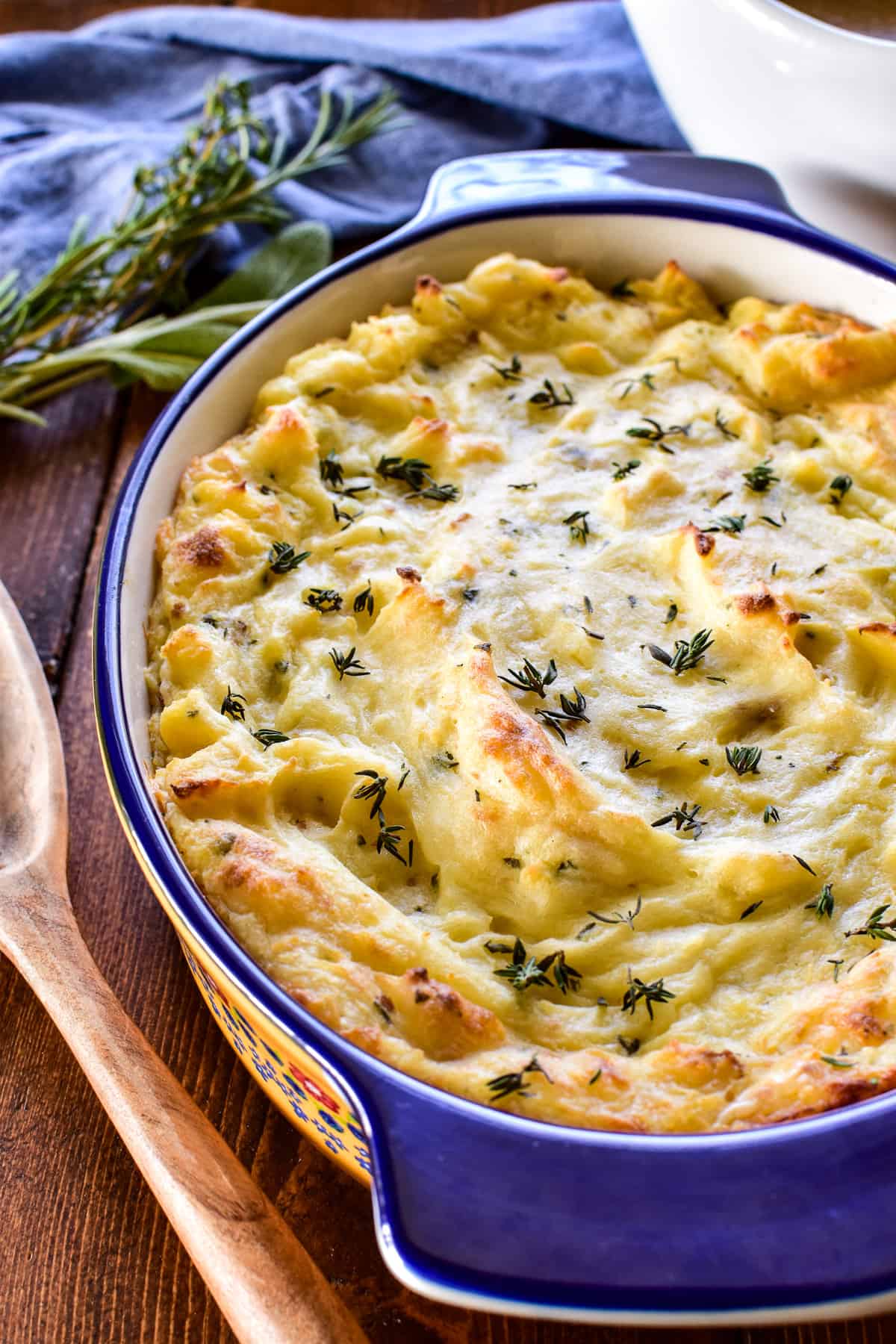 Twice Baked Mashed Potatoes topped with fresh thyme