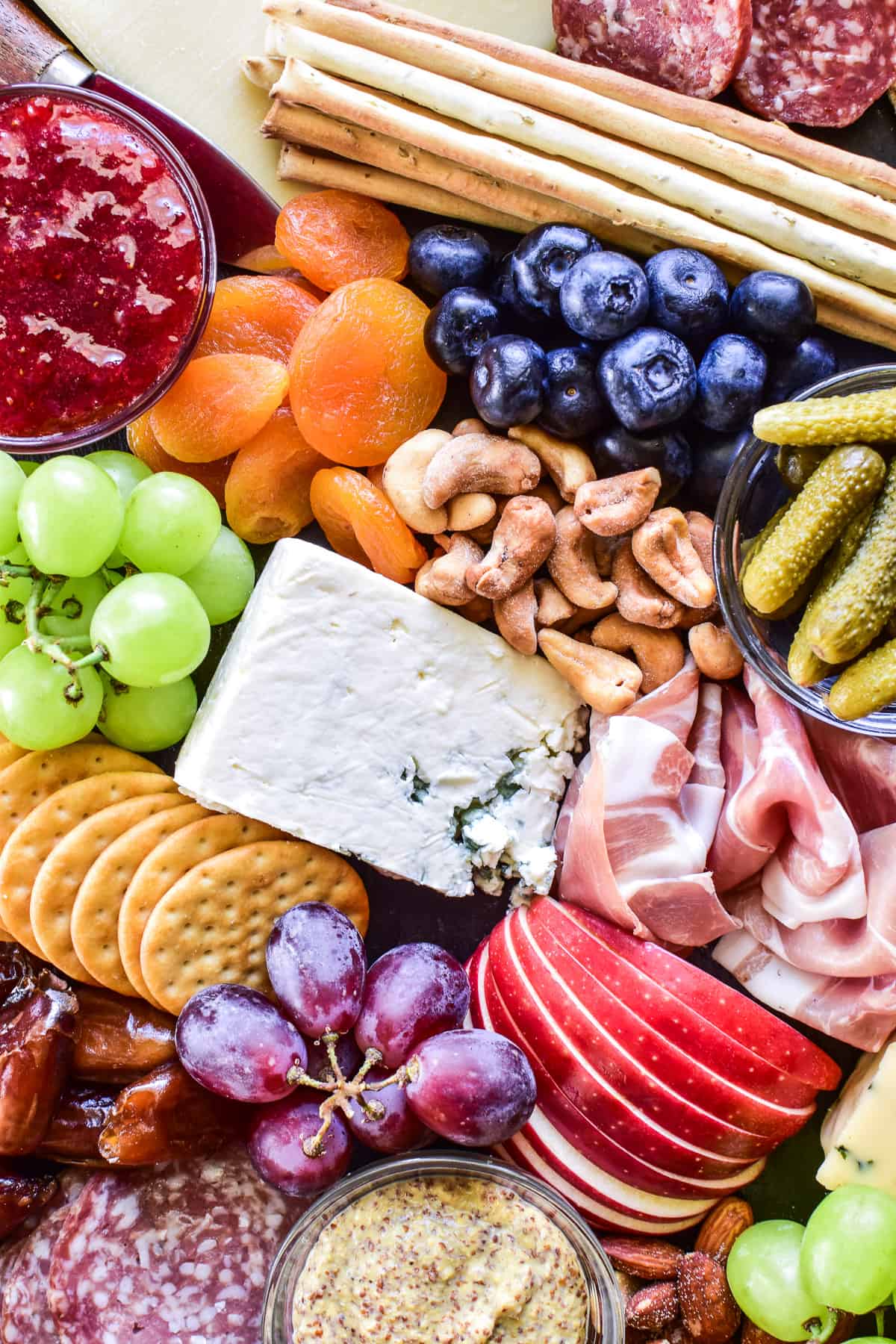 Overhead of charcuterie on a slate board