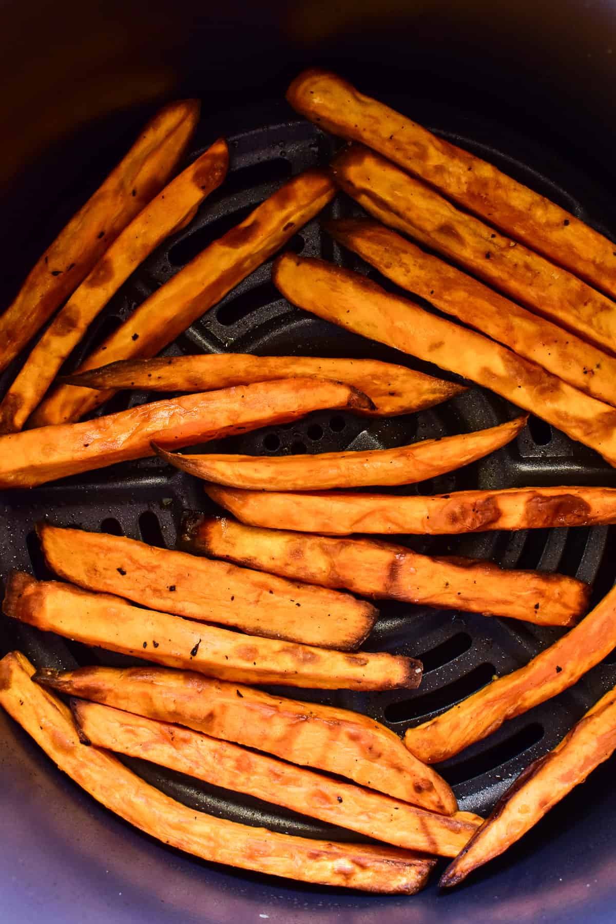 Sweet Potato Fries in an air fryer basket