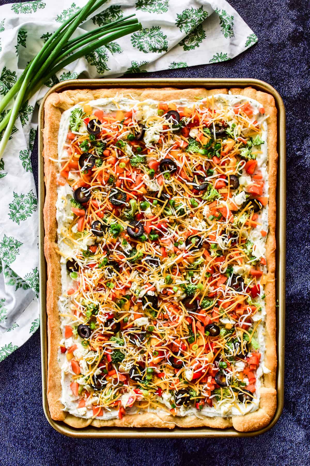 Overhead shot of Crescent Roll Veggie pizza in a 10x15 inch pan