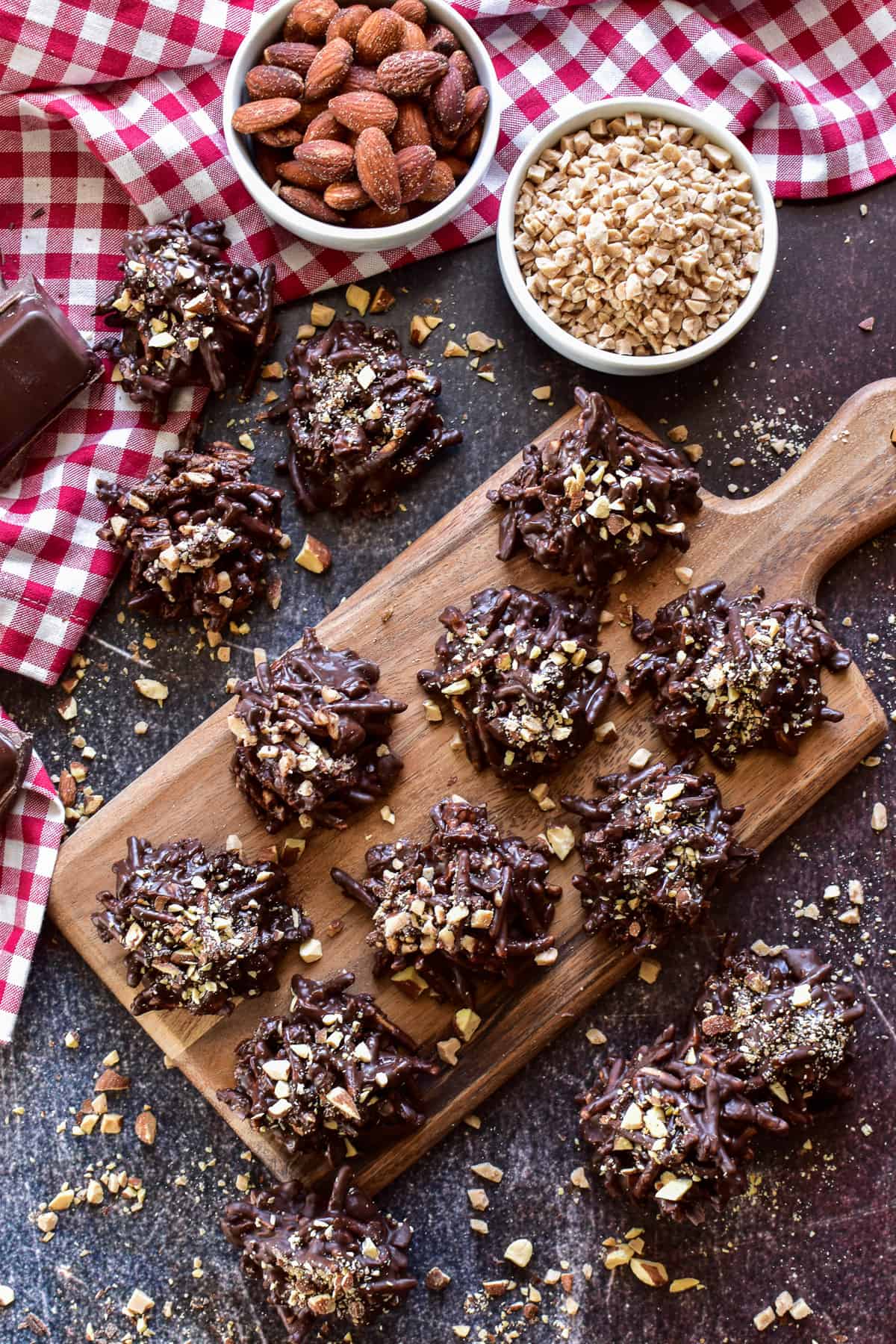 Overhead shot of English Toffee Haystack Cookies on a wooden cutting board