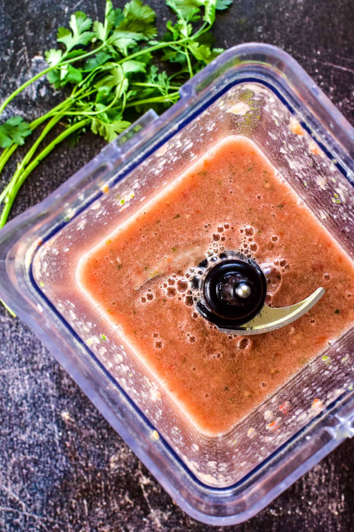 Overhead shot of salsa in a blender