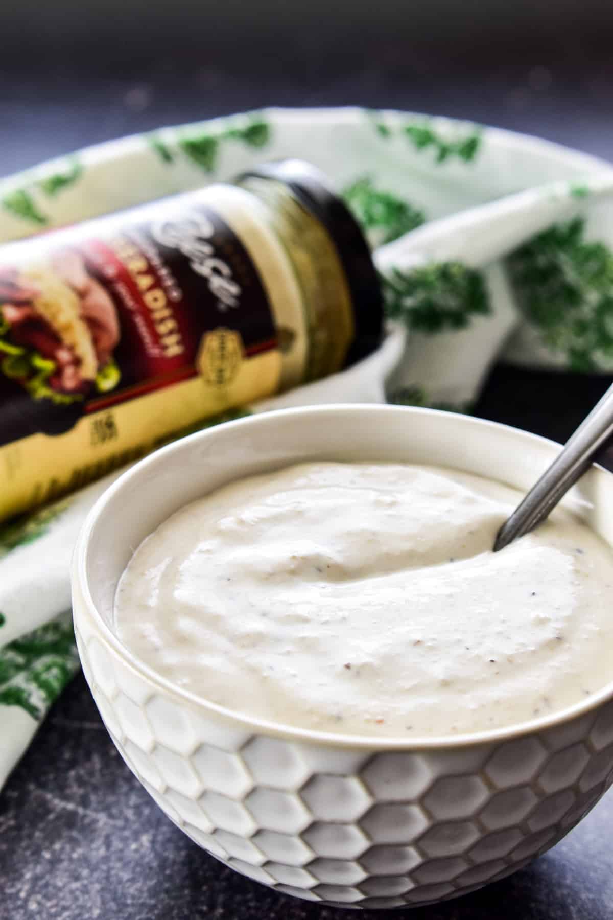 Close up of Creamy Horseradish Sauce in a small bowl