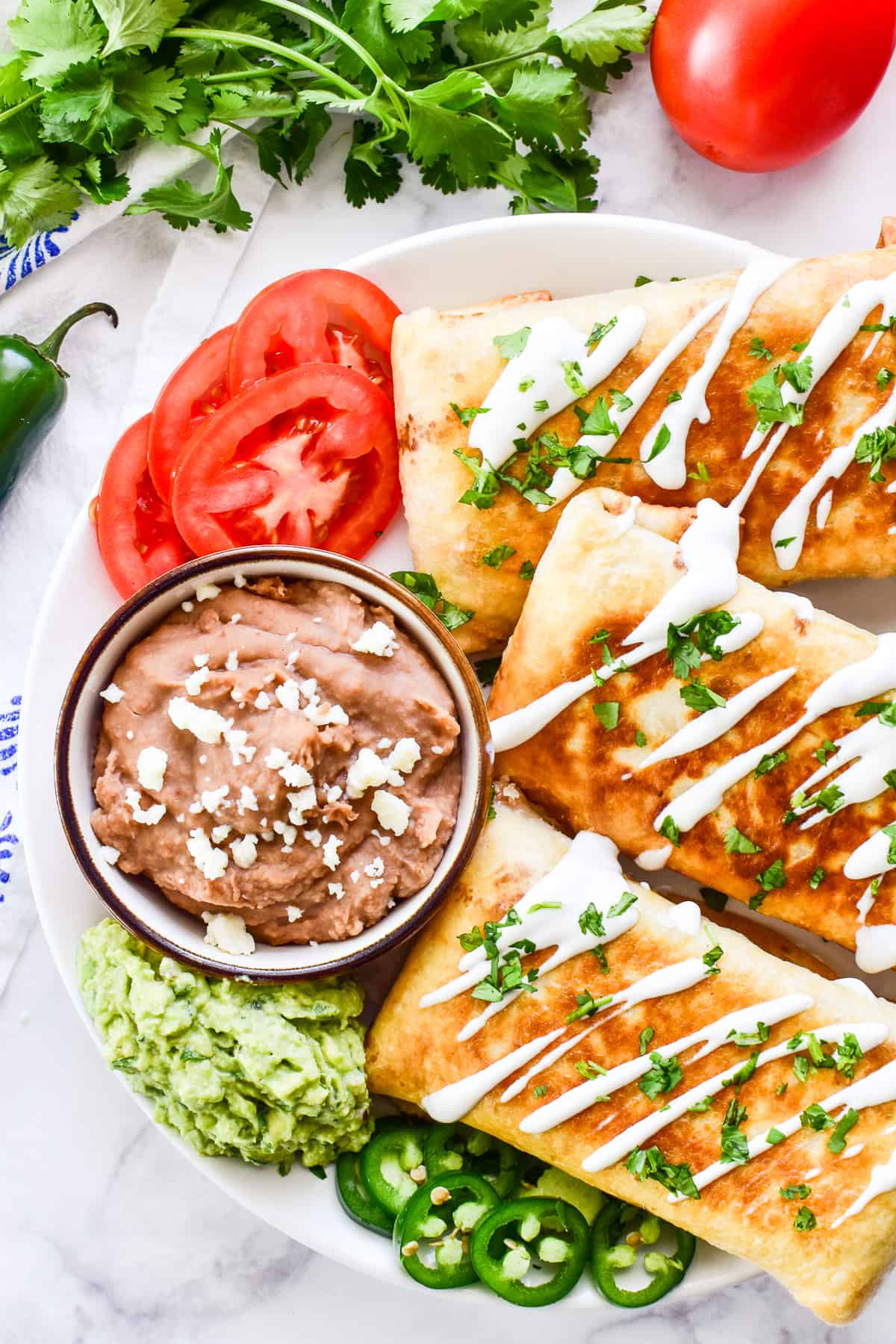 Overhead shot of Chicken Chimichangas on a serving plate