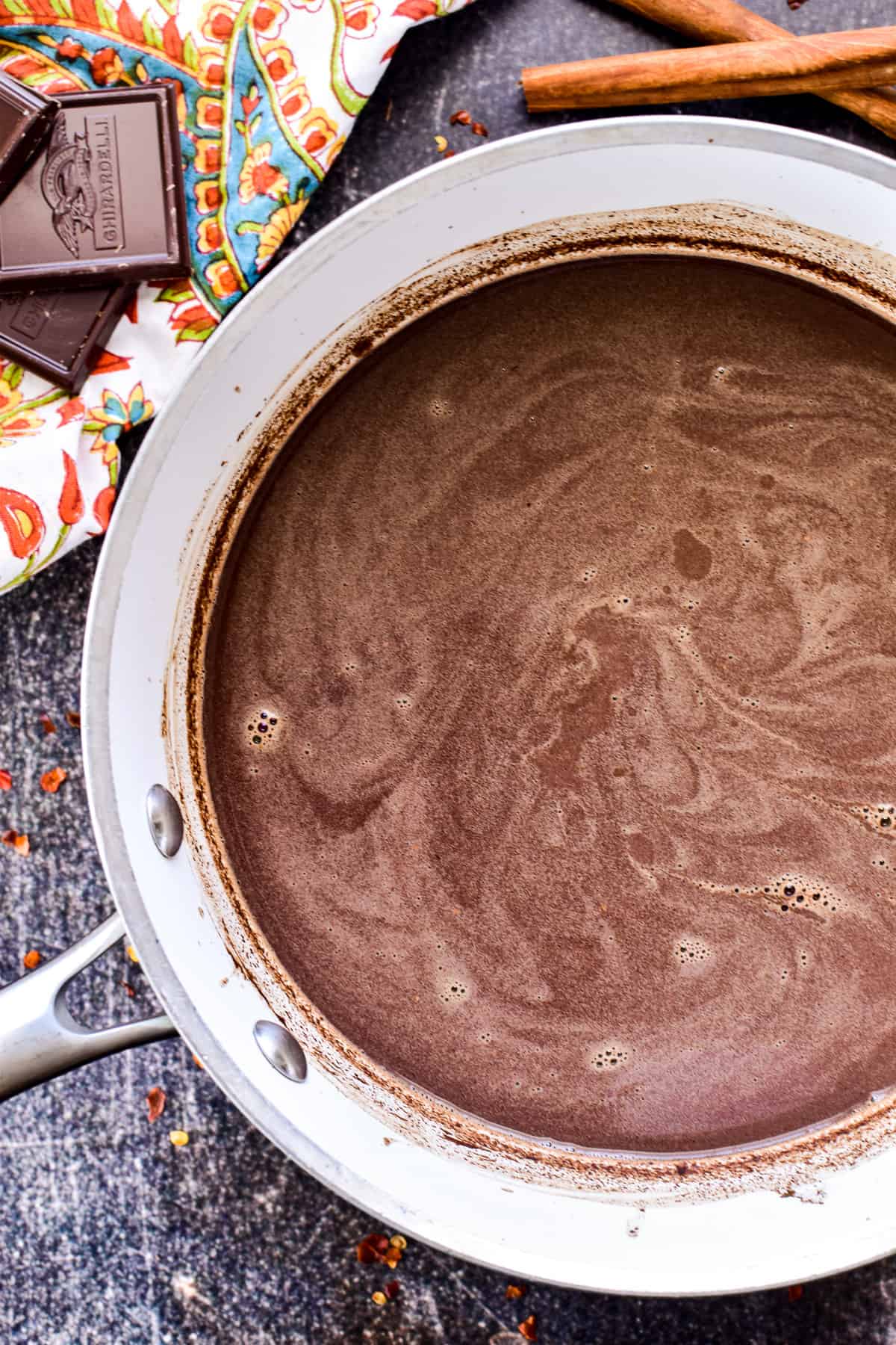 Mexican Hot Chocolate heated in a saucepan