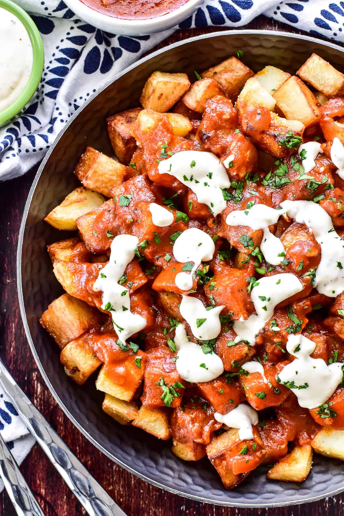 Overhead photo of Patatas Bravas with garlic aioli