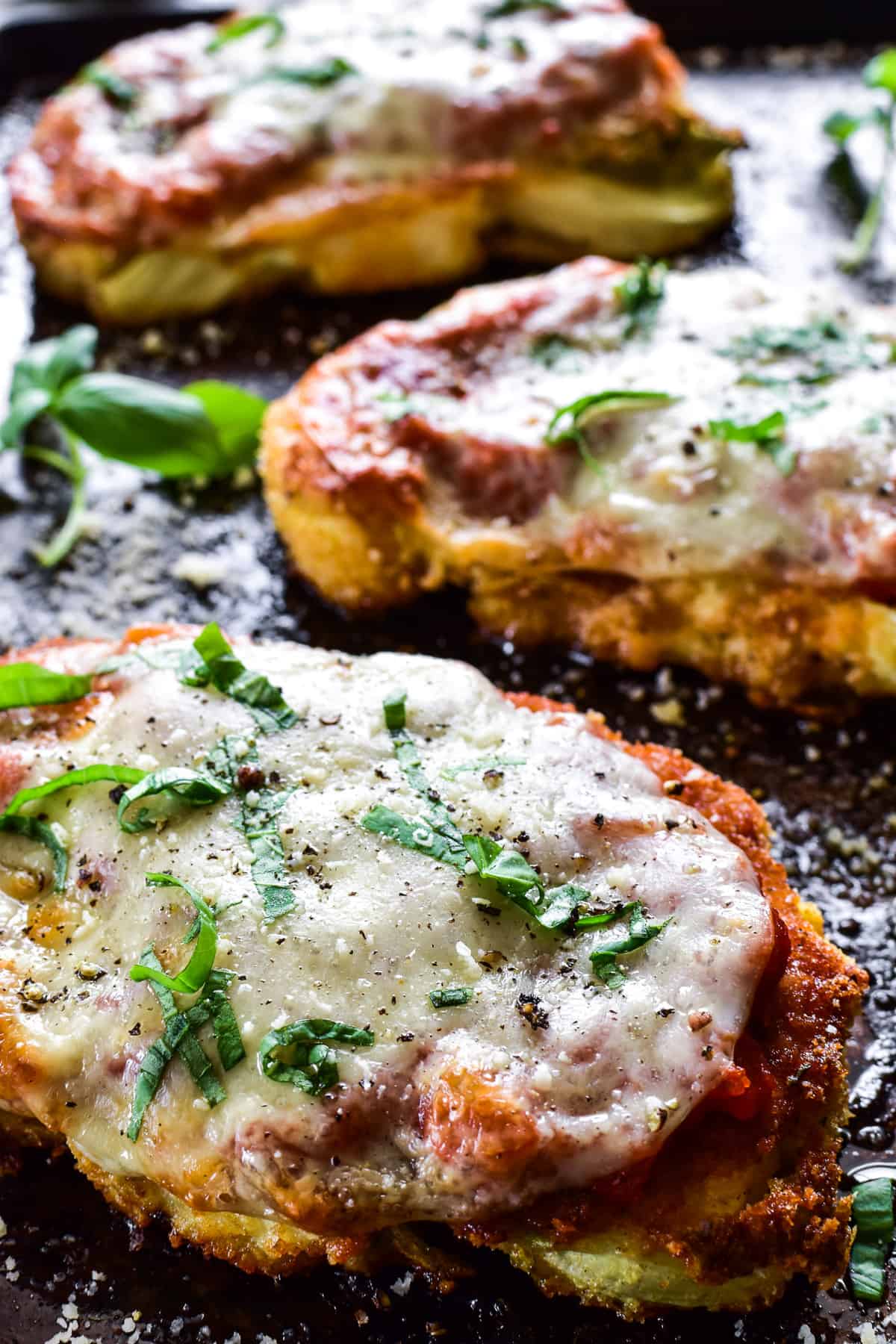 Close up of Cauliflower Parmesan with fresh basil