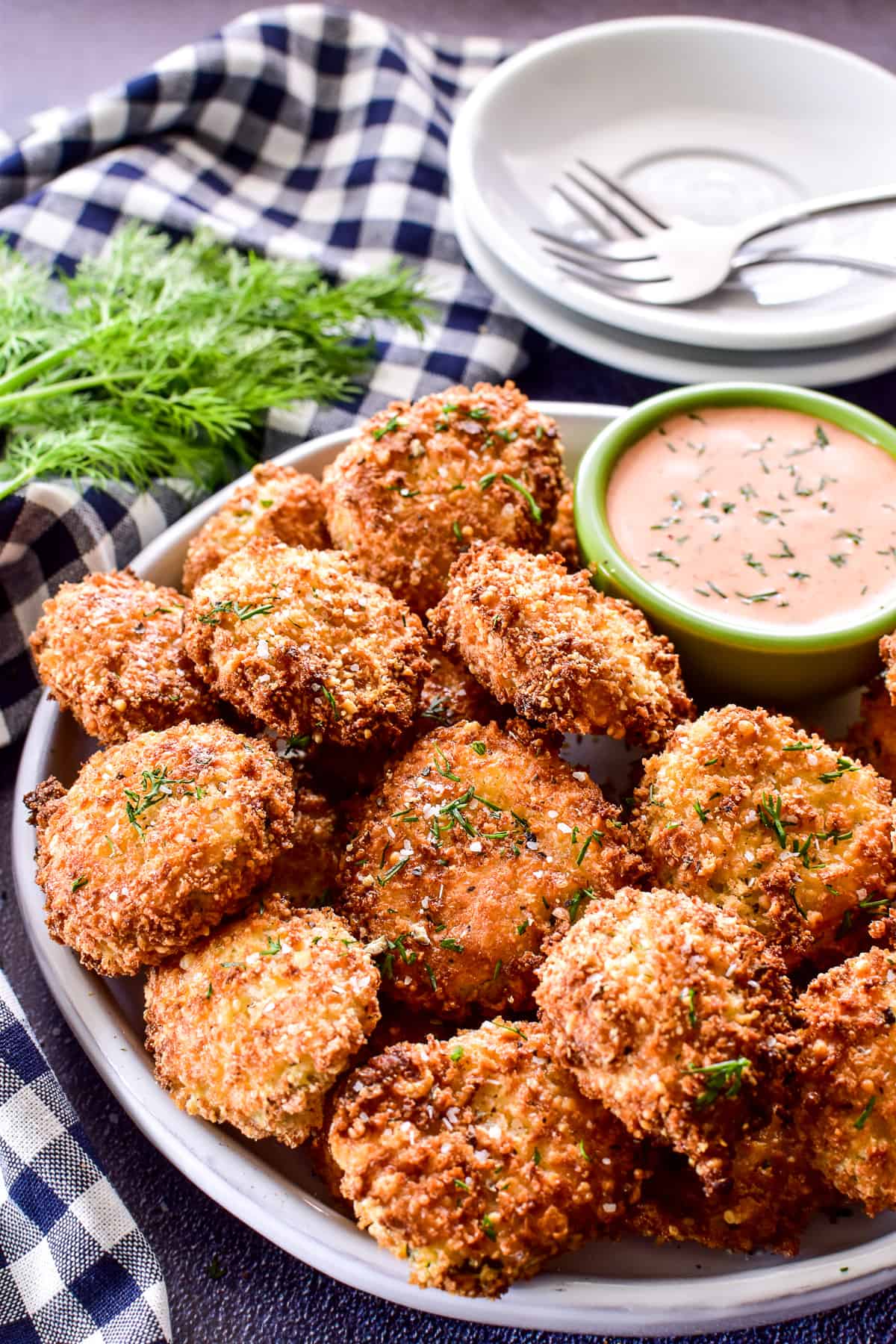 Close up of Air Fryer Pickles on a white plate