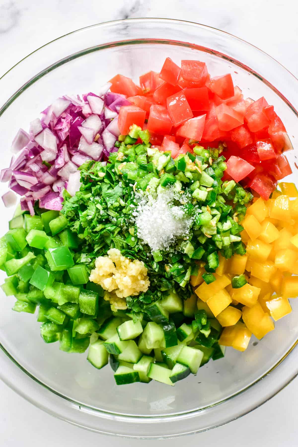 Cucumber Salsa ingredients in a mixing bowl