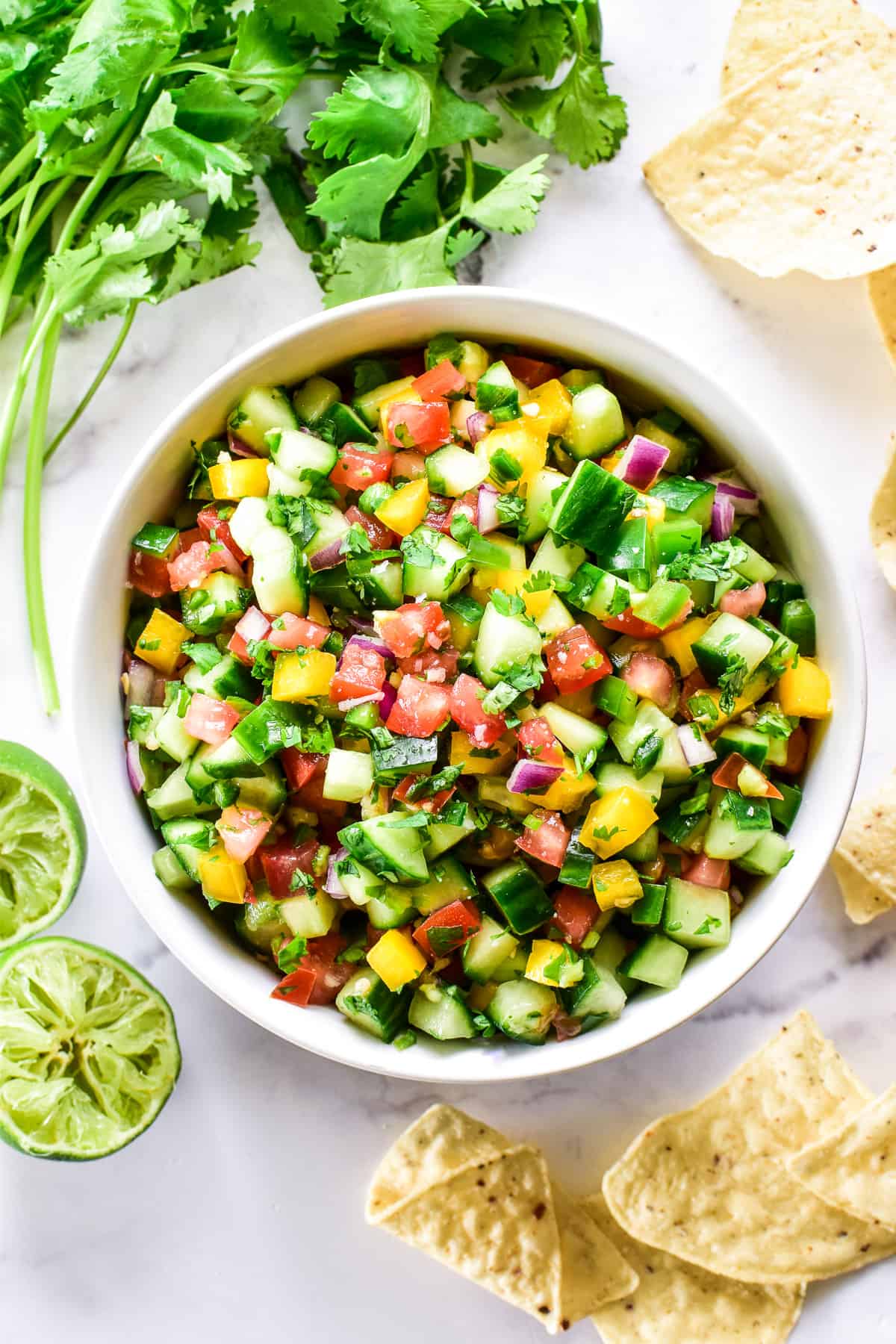 Overhead image of Cucumber Salsa in a white bowl