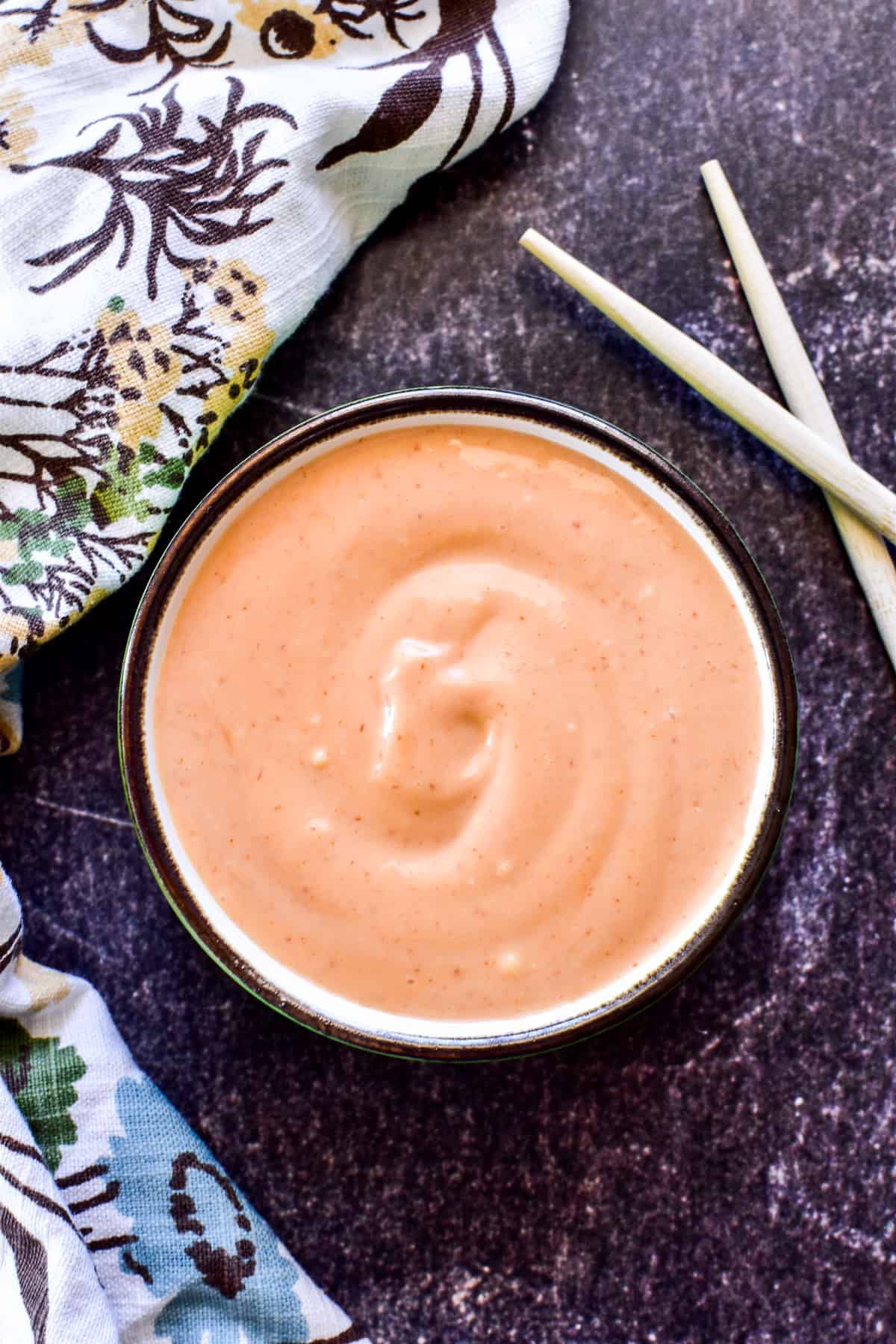 Overhead image of Spicy Mayo with a floral napkin and chopsticks